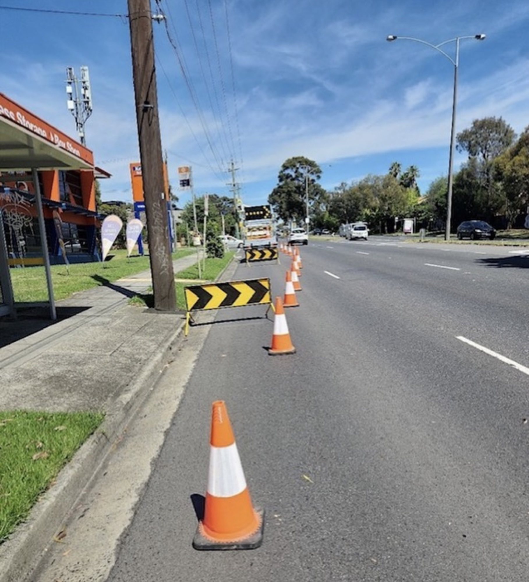 MLA Traffic cones lining a Melbourne arterial road for civil works