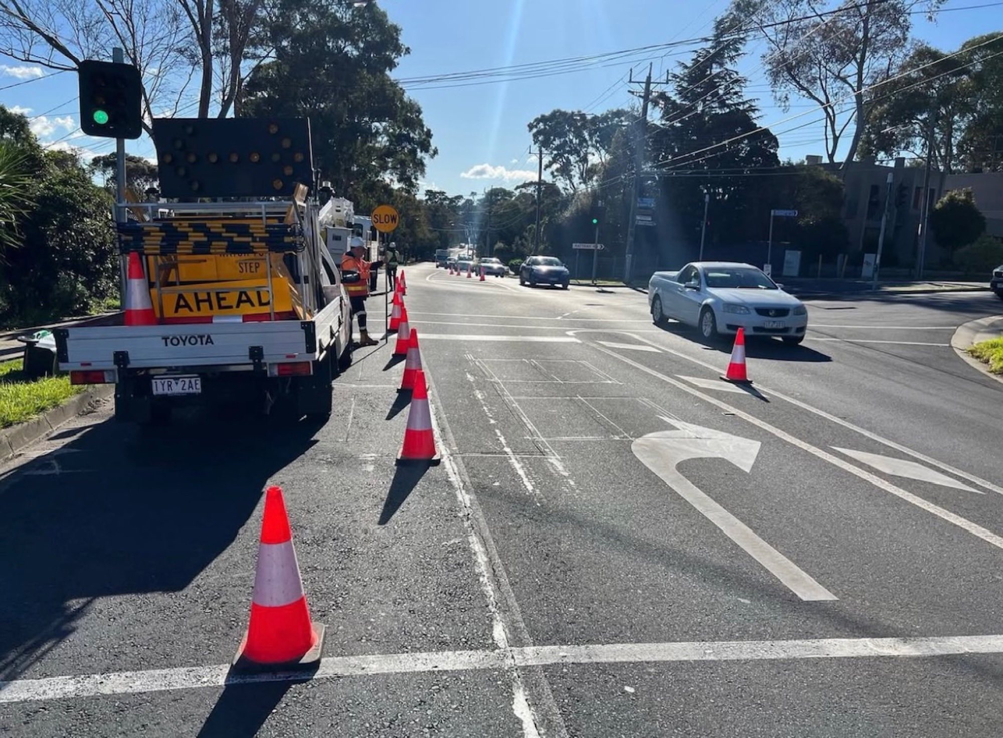 MLA Traffic AHEAL truck managing an arterial road with cones