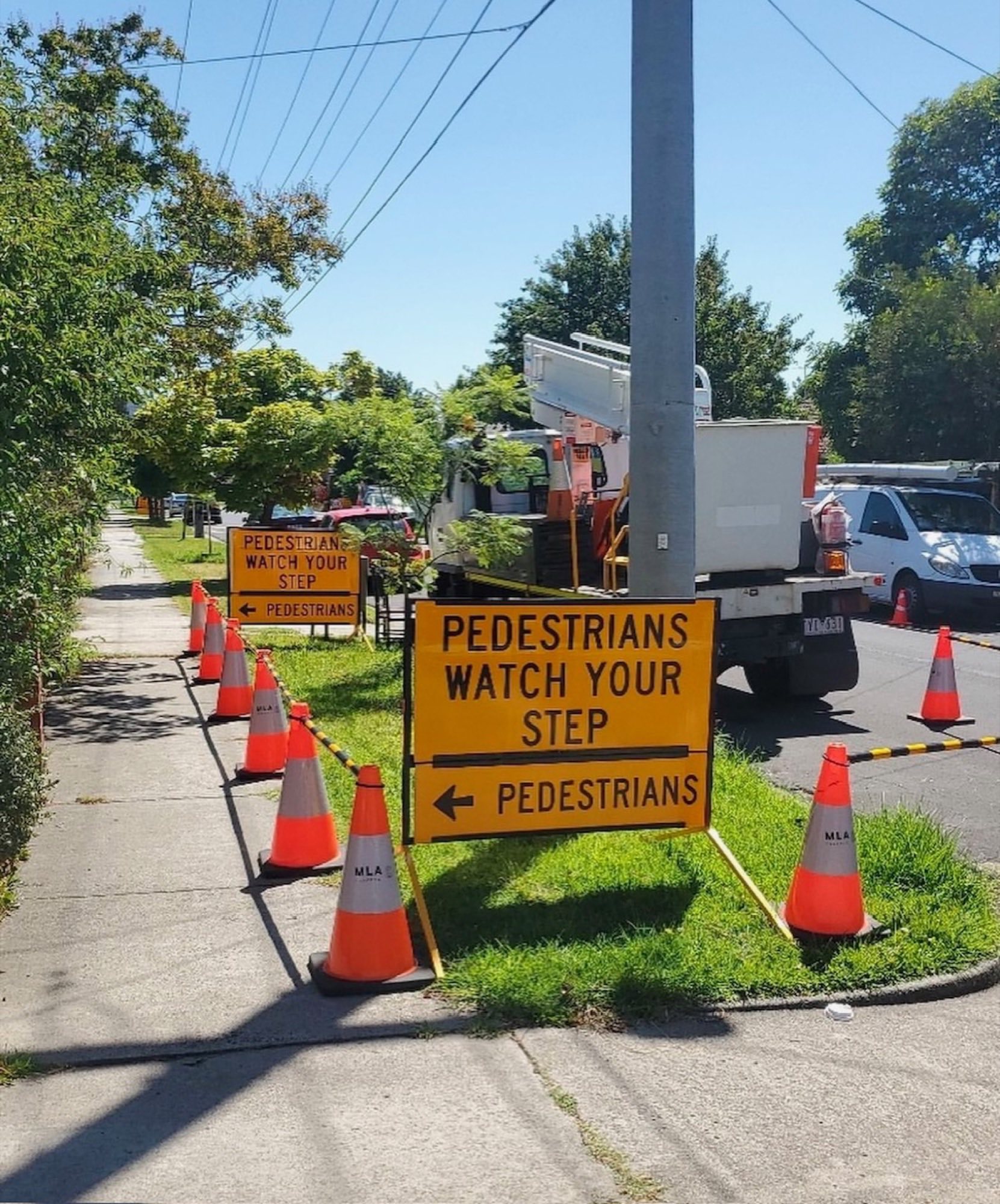 MLA Traffic pedestrian management signage and cones on a Melbourne street